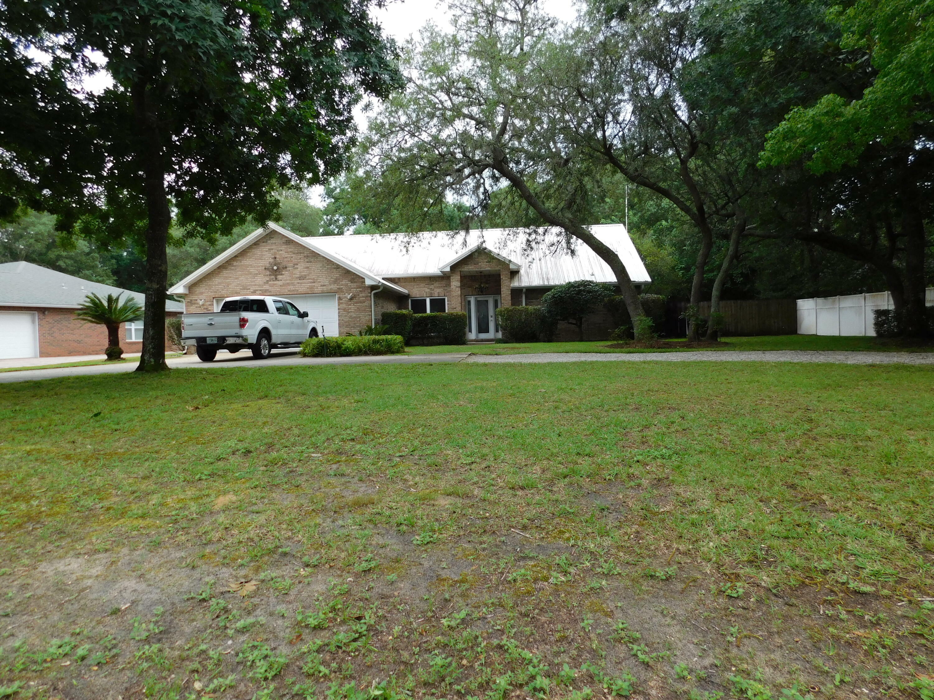 Property Photo:  6803 Avenida De Galvez  FL 32566 