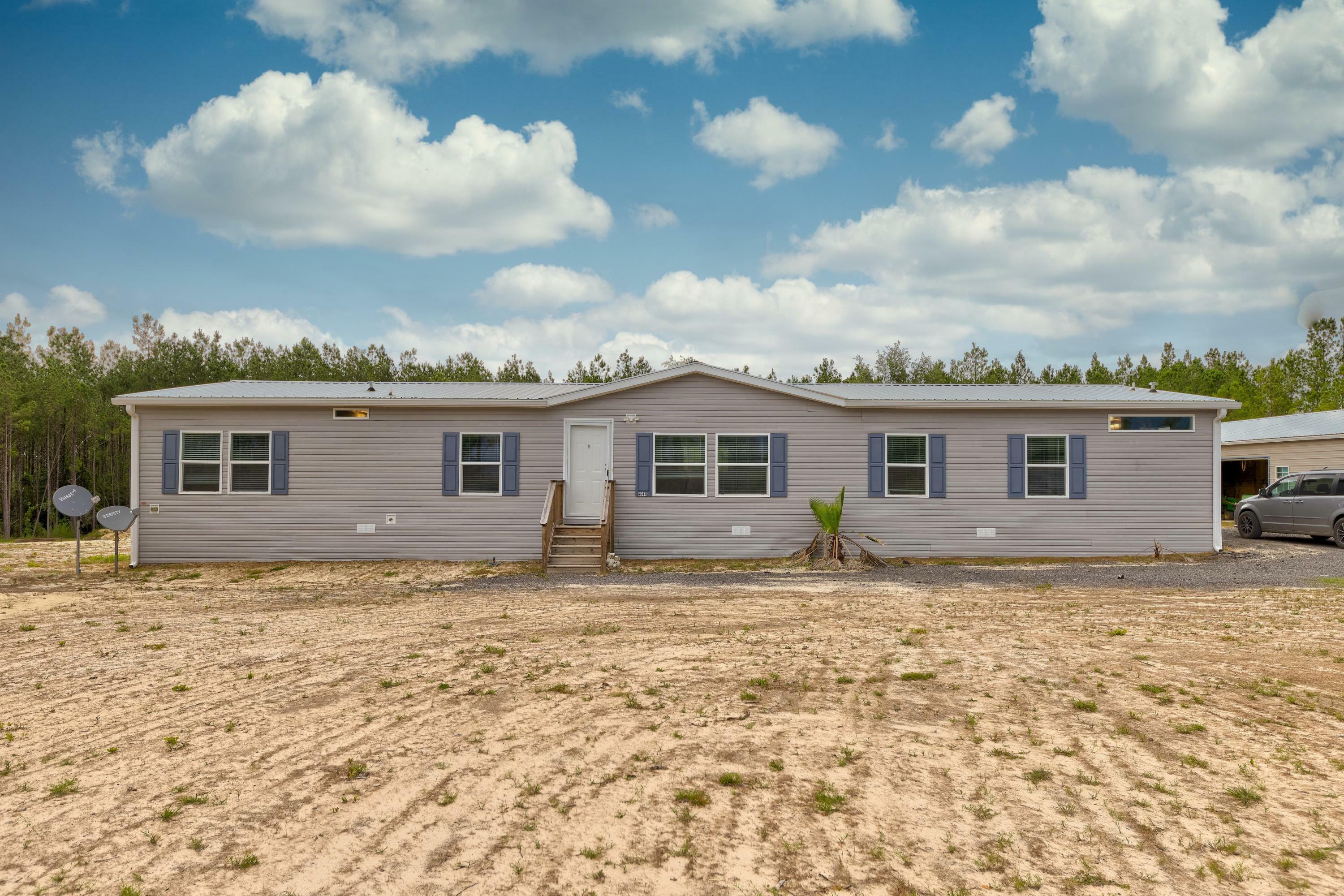 Property Photo: 6647 Caveman Road FL 32567
