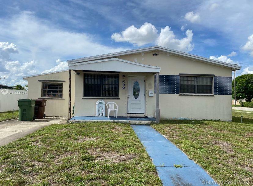 Property Photo:  699 E 56th St  FL 33013 