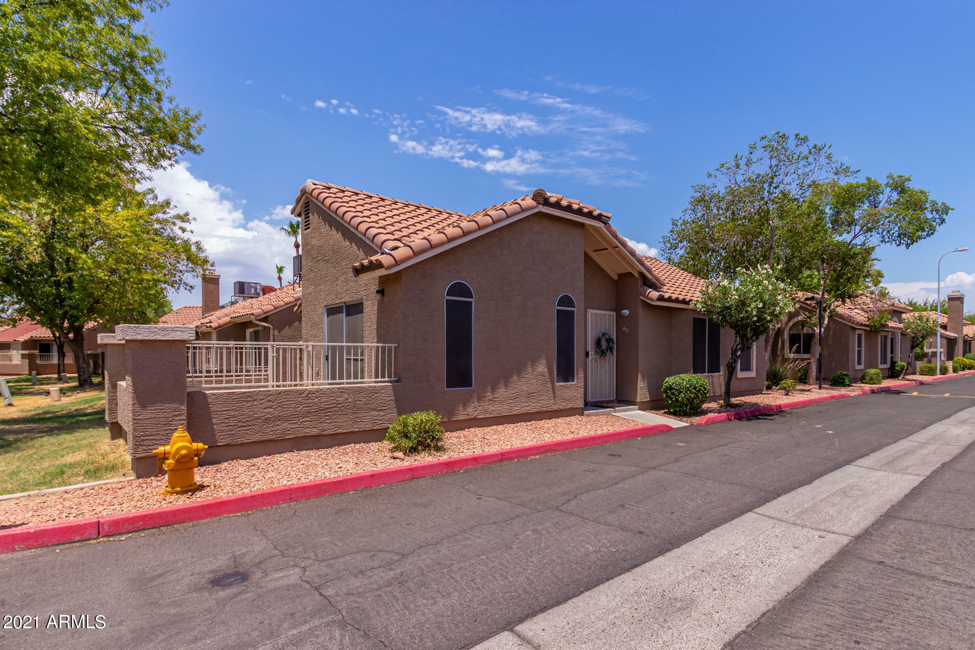 Property Photo:  7040 W Olive Avenue 45  AZ 85345 