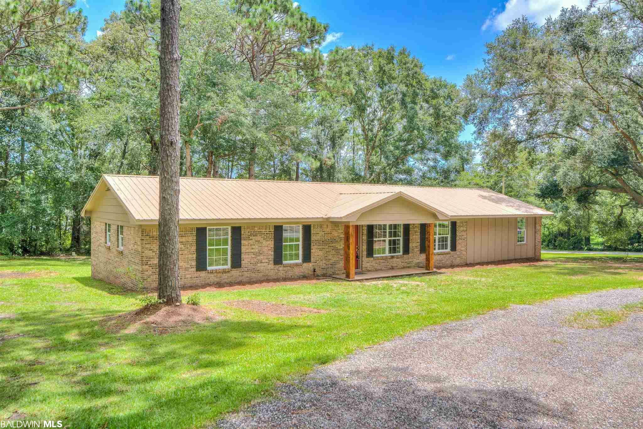 Property Photo:  23560 N River Road  AL 36526 