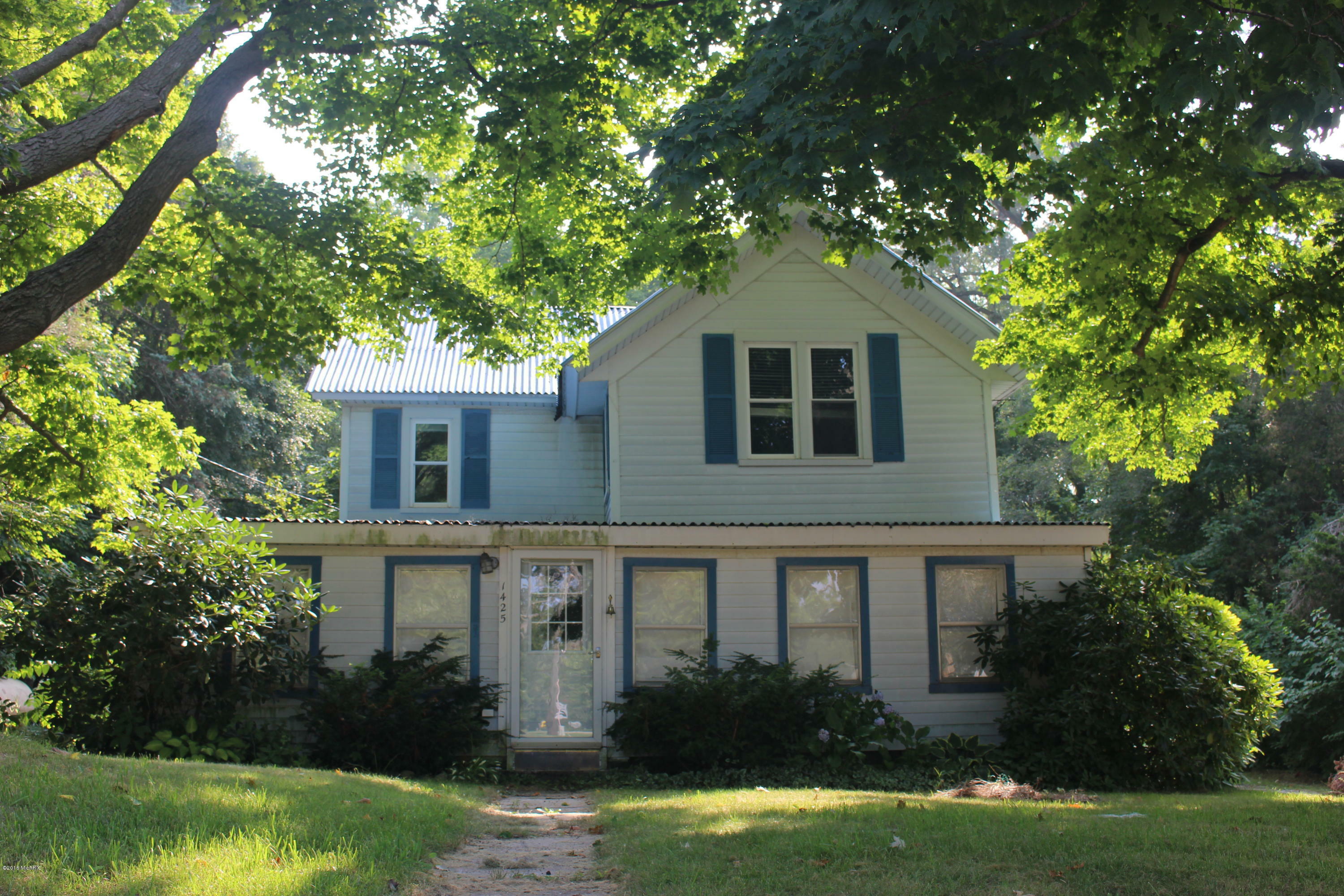 Property Photo:  1425 Blue Star Highway  MI 49408 