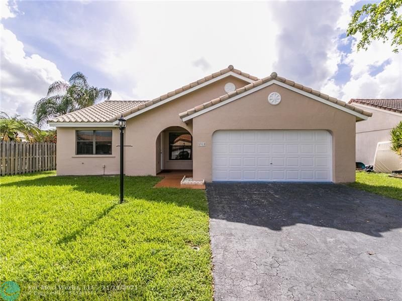 Property Photo: 5910 Epsom Ln FL 33331