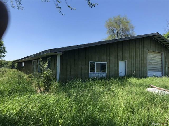 Property Photo:  513 N Bamber Rd Road  MI 48858 