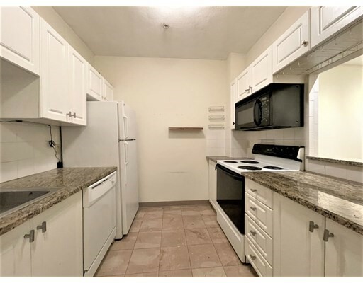 Property Photo: 373 Highland Ave 212 MA 02144