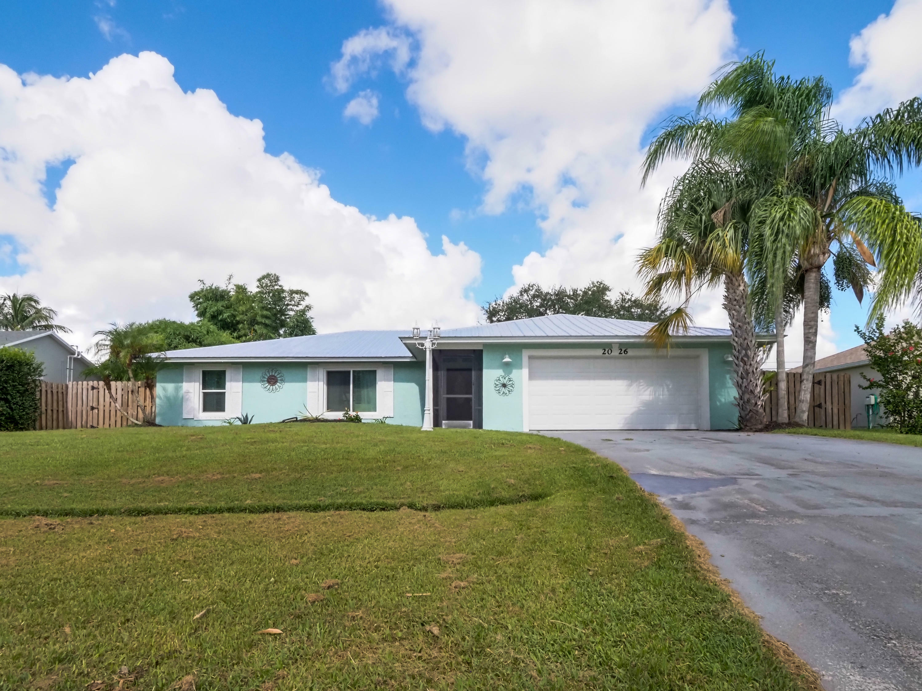 Property Photo:  2026 SW Ember Street  FL 34953 