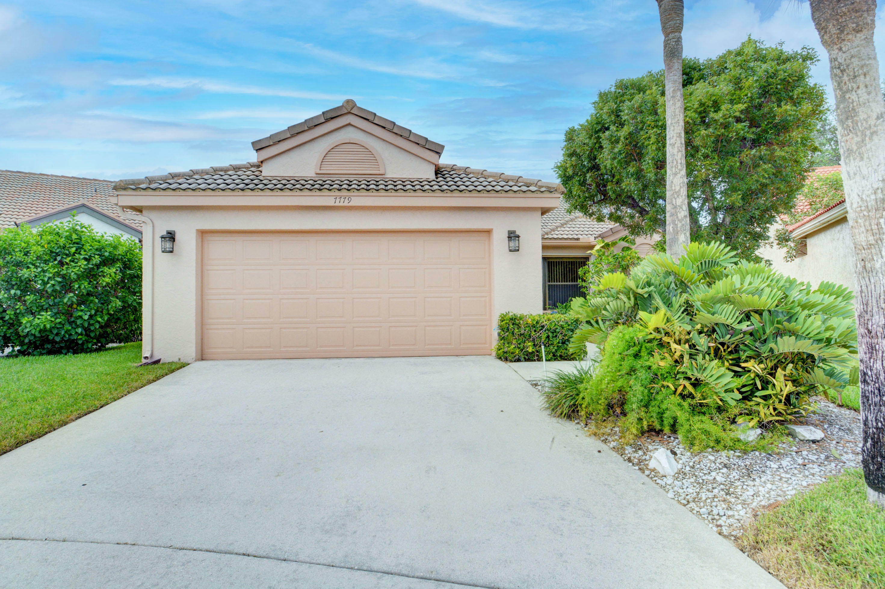 Property Photo:  7779 Grovewood Drive  FL 33467 