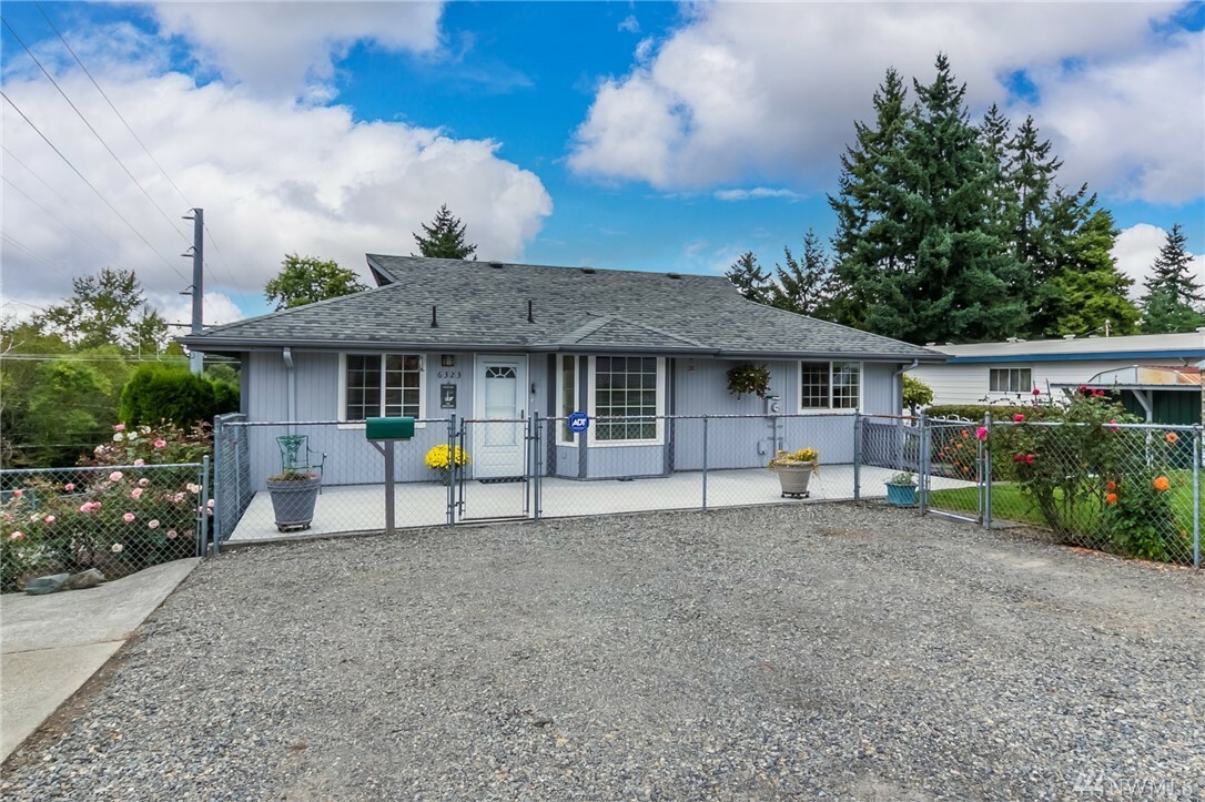 Property Photo:  6323 S Sheridan Ave  WA 98408 