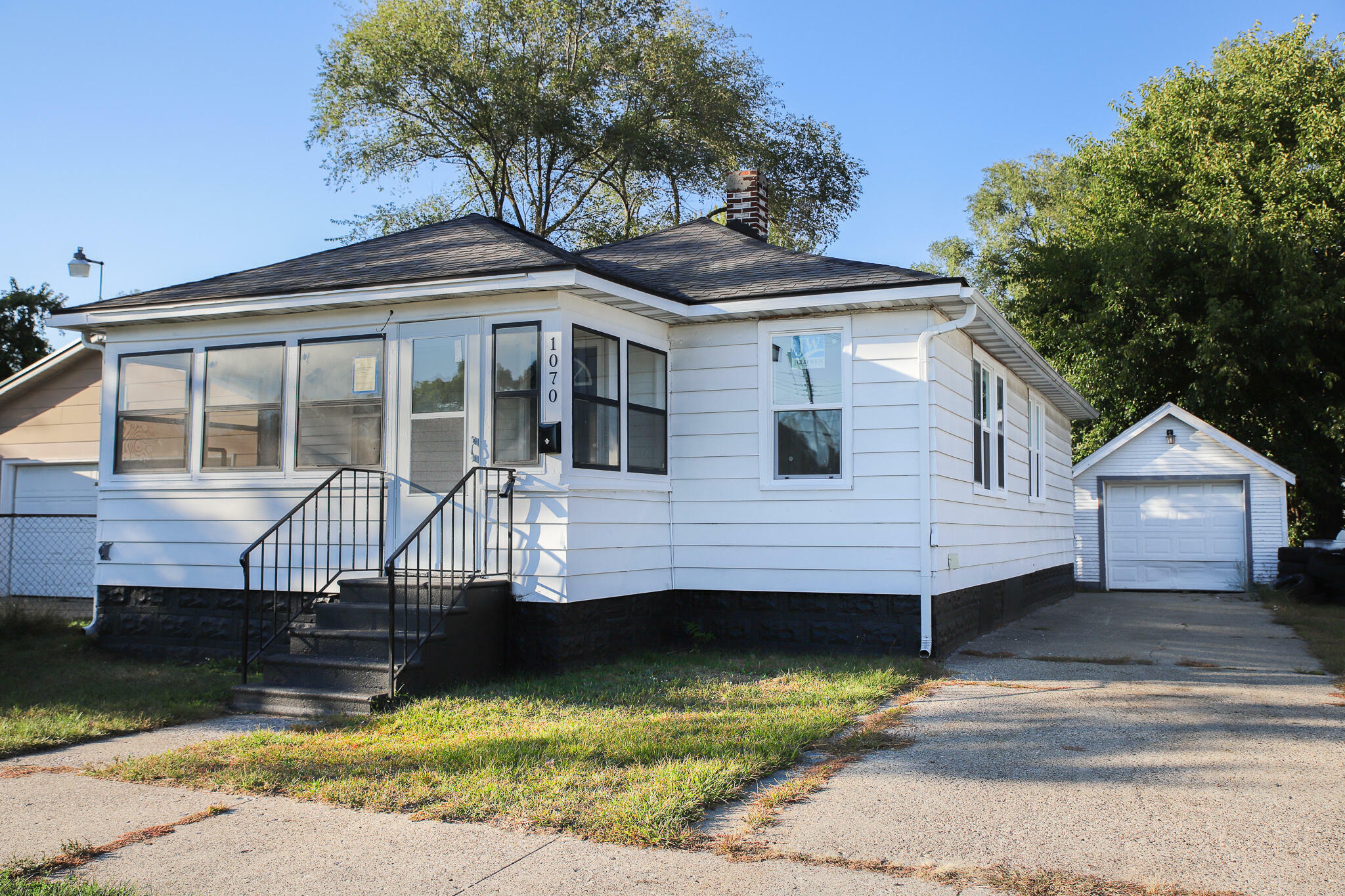 Property Photo:  1070 E Laketon Avenue  MI 49442 