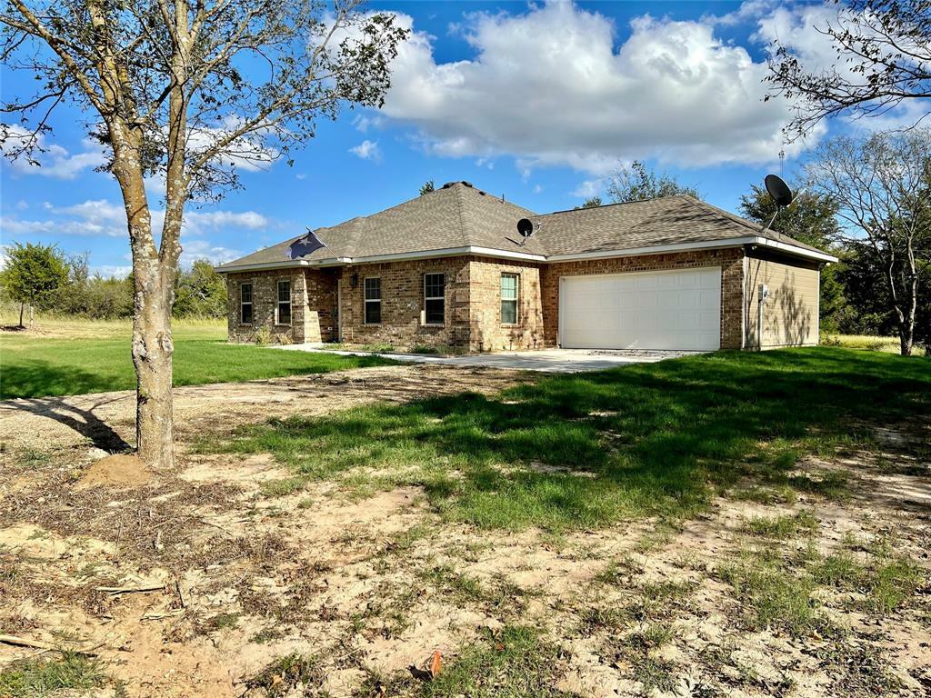 Property Photo:  1001 SE County Road 3048E  TX 75109 