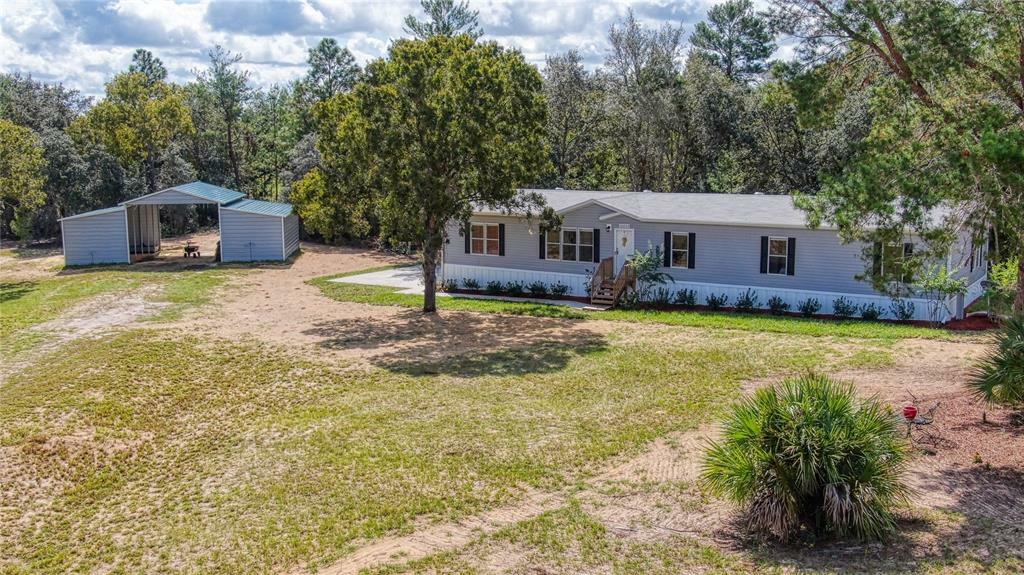 Property Photo:  16090 SE 112th Place Road  FL 32179 