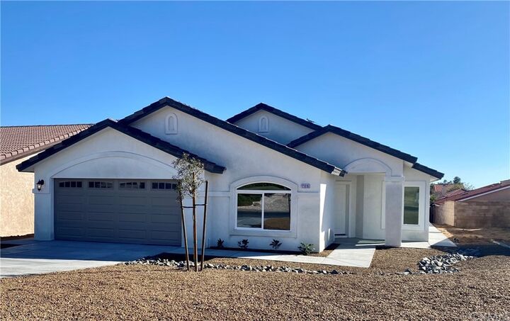 Property Photo: 12813 Autumn Leaves Avenue CA 92395