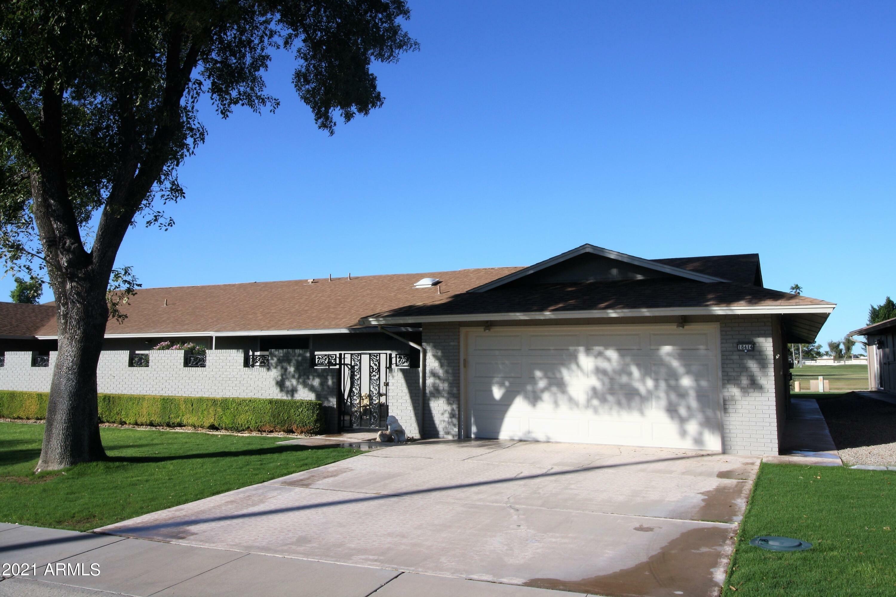 Property Photo: 18414 N 104th Avenue AZ 85373
