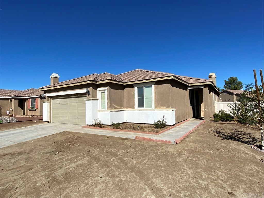 Property Photo:  11798 Poppy Road  CA 92301 