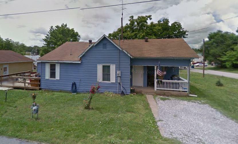 Property Photo:  402 SE G Street  AR 72712 