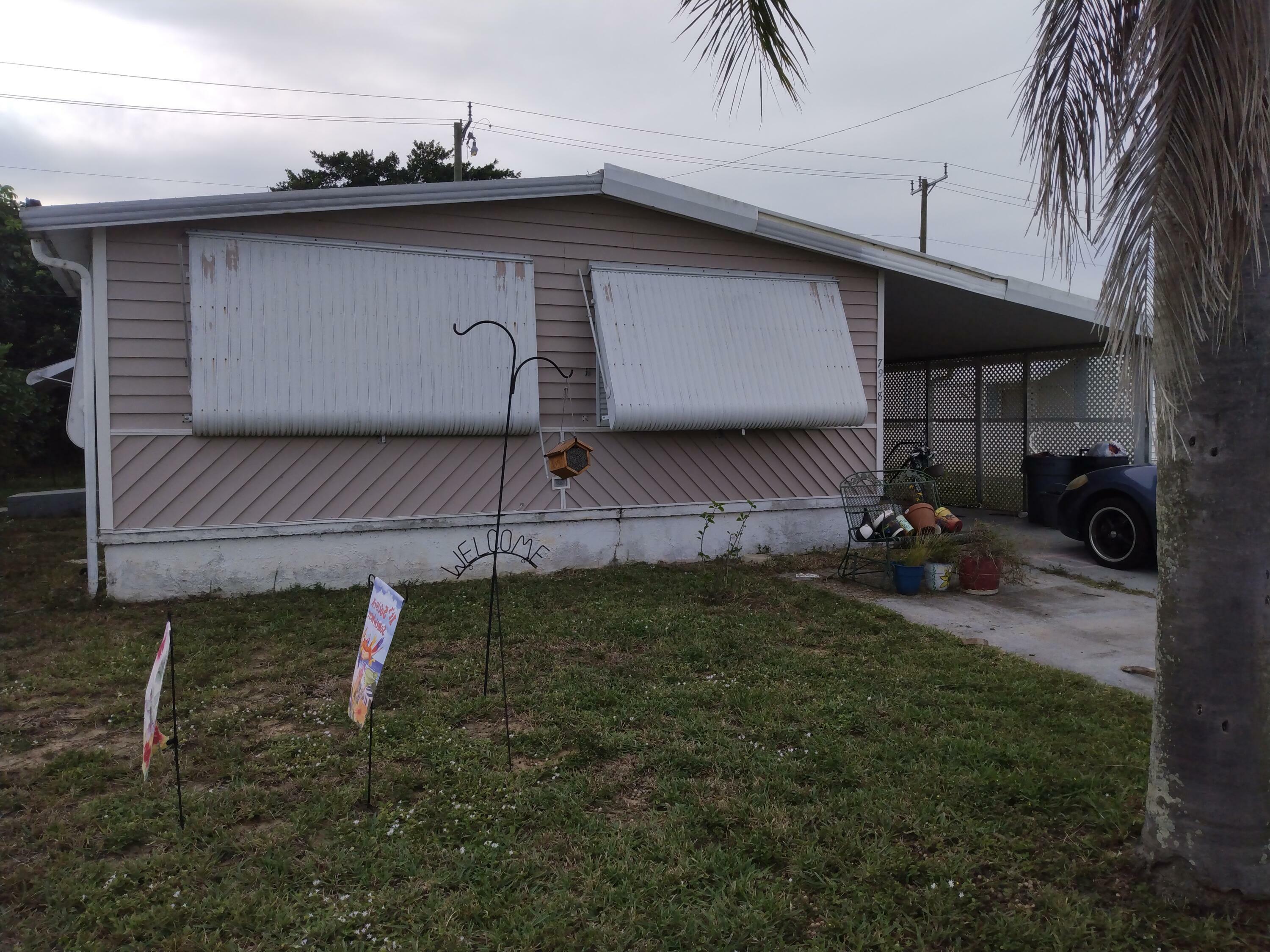 Property Photo:  7918 SE Swan Avenue  FL 33455 