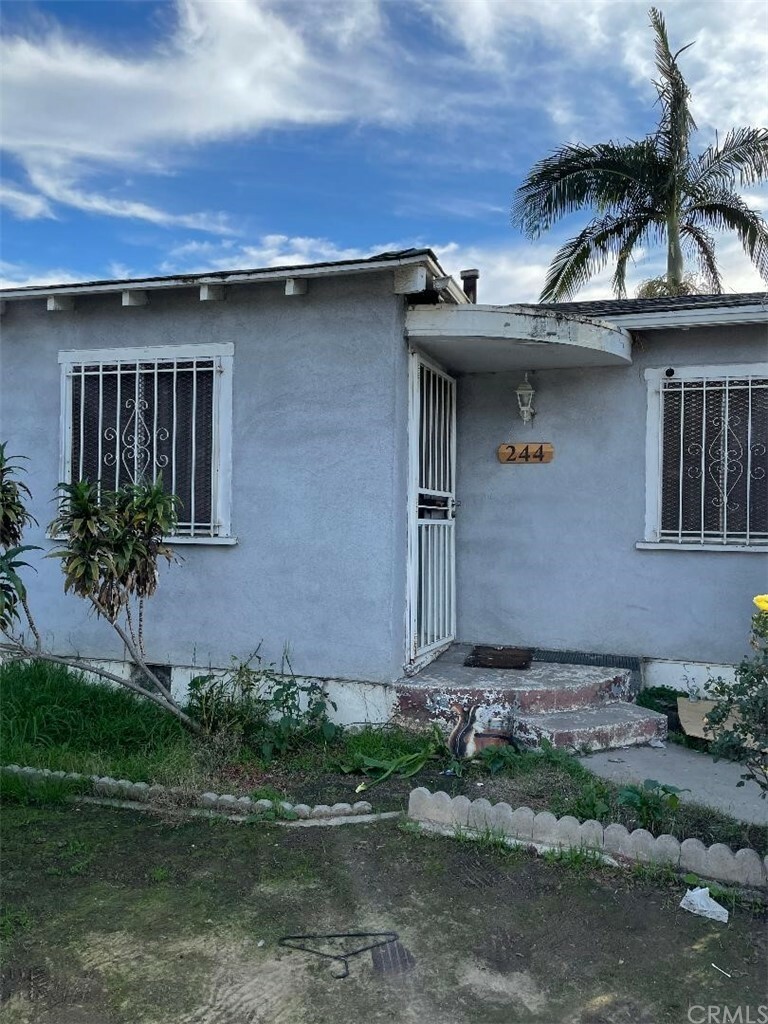 Property Photo:  244 E 118th Street  CA 90061 