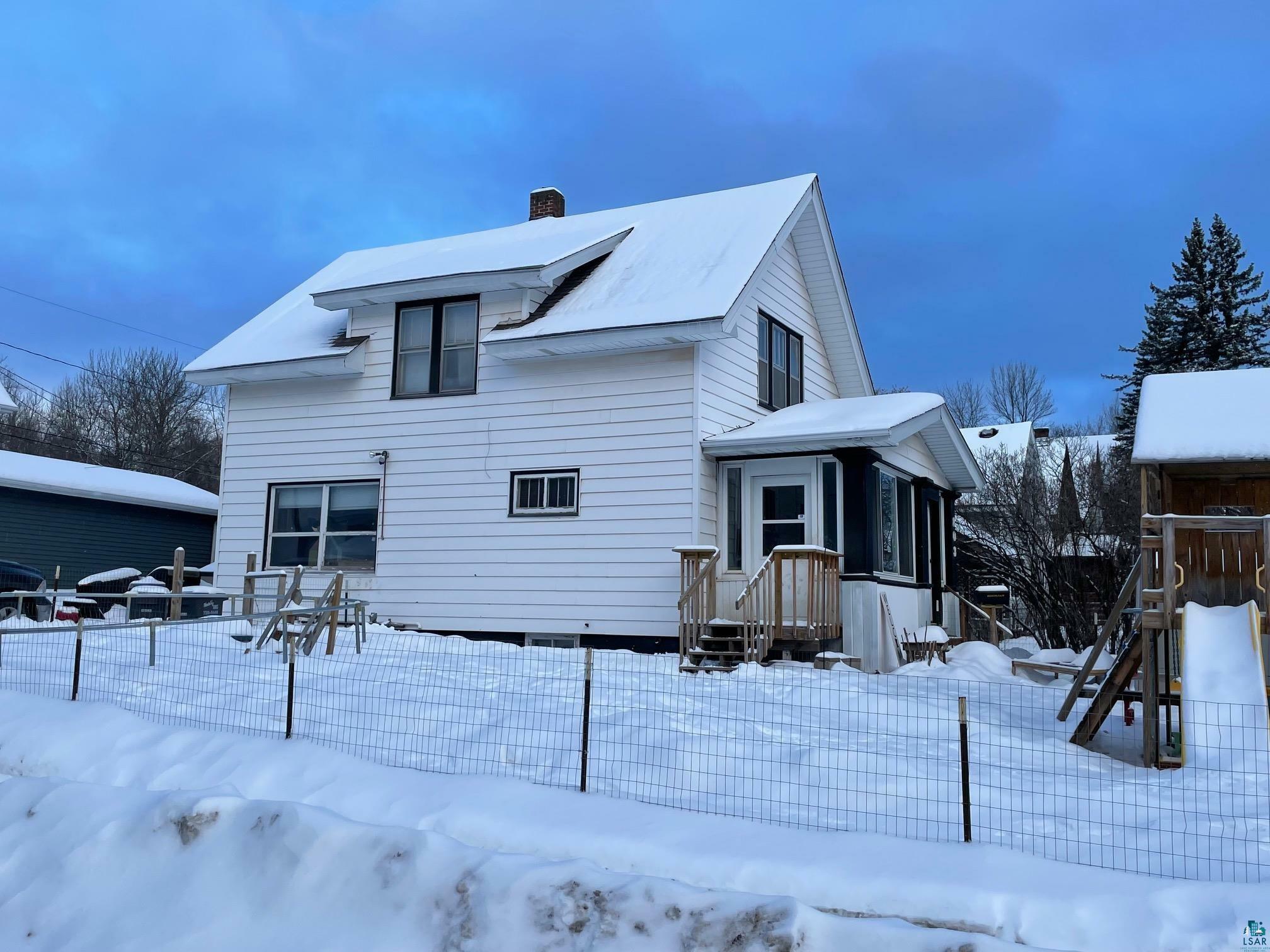 Property Photo:  803 N 57th Ave W  MN 55807 