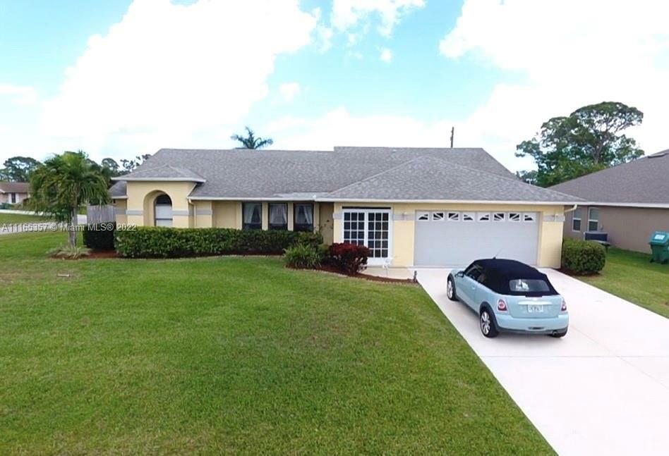 Property Photo: 1901 SW Scorpio Ln FL 34984
