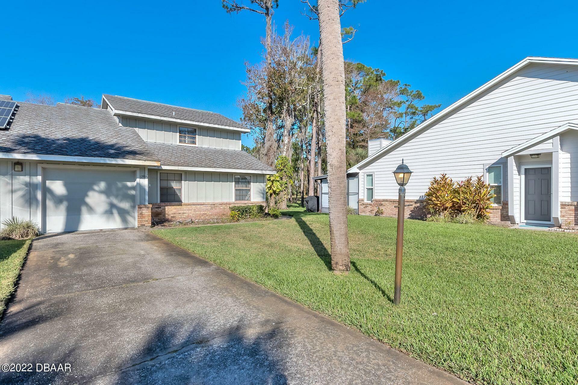 Property Photo:  128 Bob White Court 1280  FL 32119 