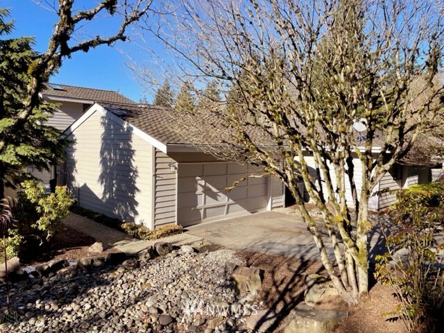 Property Photo:  15800 Village Green Drive 4  WA 98012 