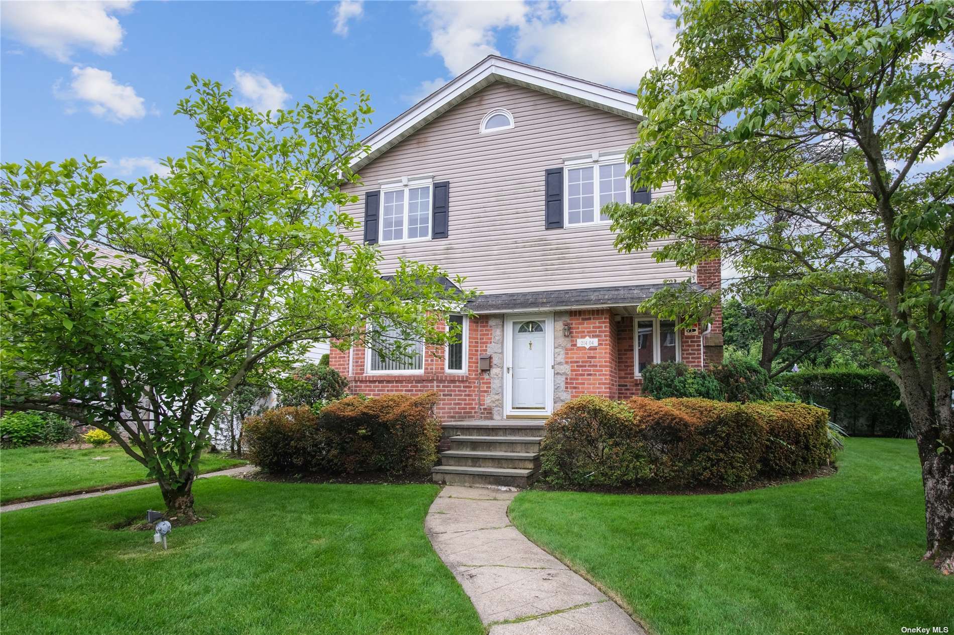 Property Photo: 214-04 86th Avenue NY 11427