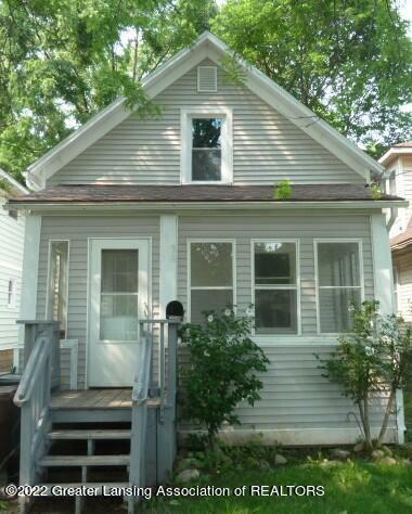 Property Photo:  118 Smith Avenue  MI 48910 