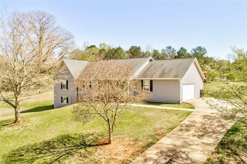 Property Photo:  6387 Cowan Mill Road  GA 30187 