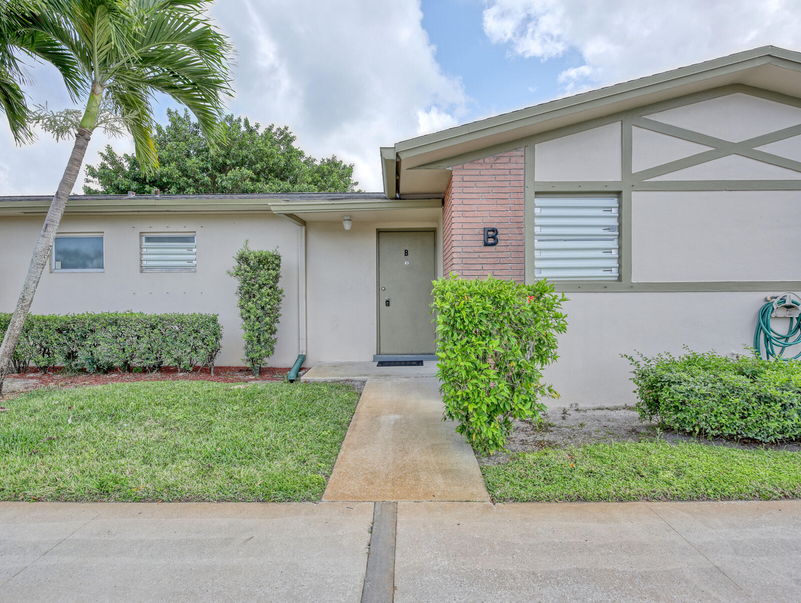 Property Photo:  2590 Barkley Drive E B  FL 33415 
