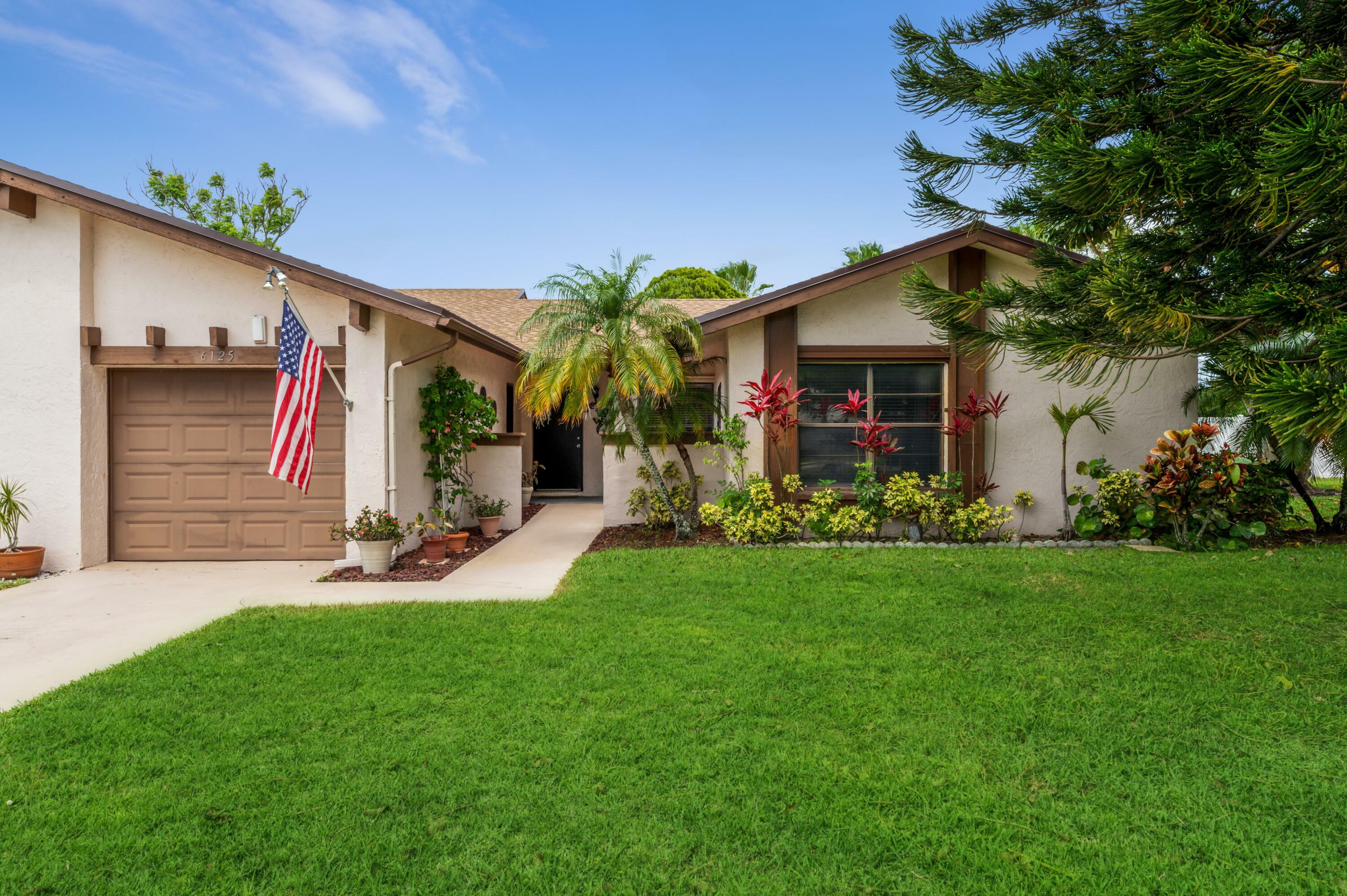 Property Photo:  6125 Elsinore Circle  FL 33463 