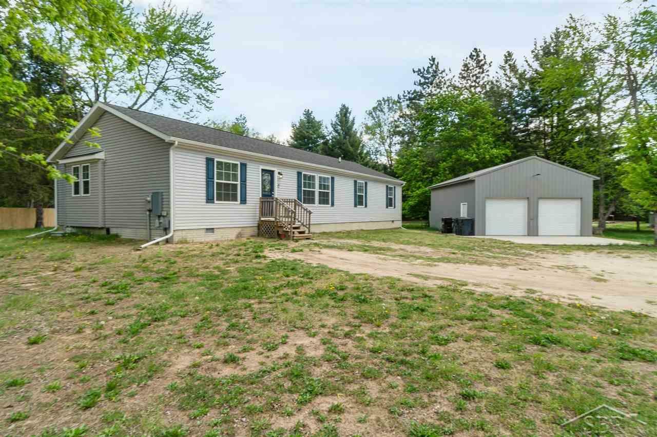 Property Photo:  8414 N Sturgeon Road  MI 48642 