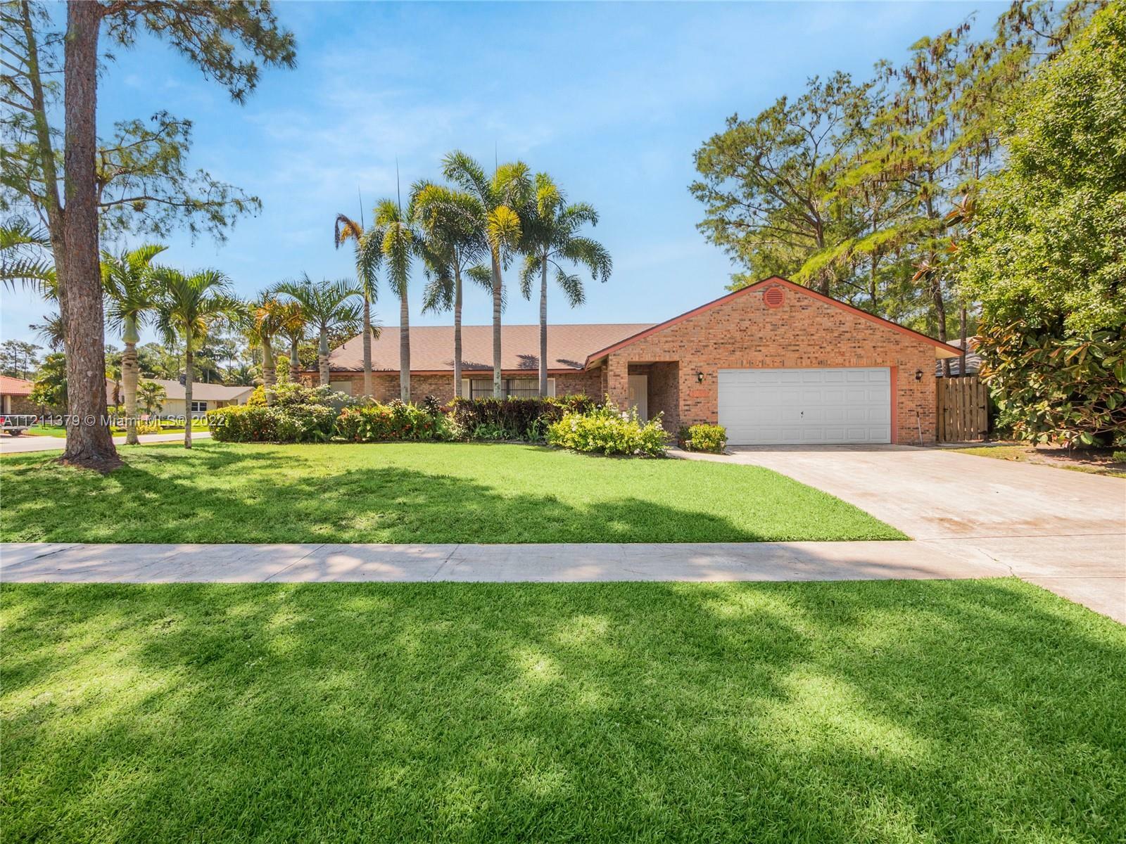 Property Photo:  1360 Raintree Ln  FL 33414 