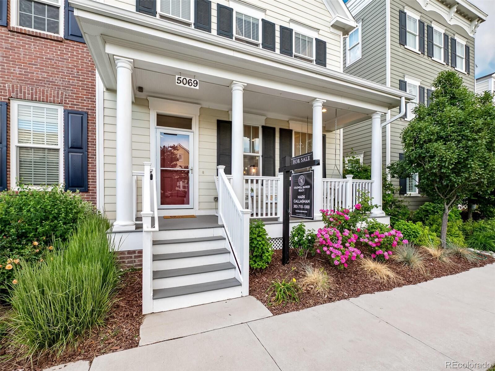 Property Photo: 5069 Valentia Street CO 80238