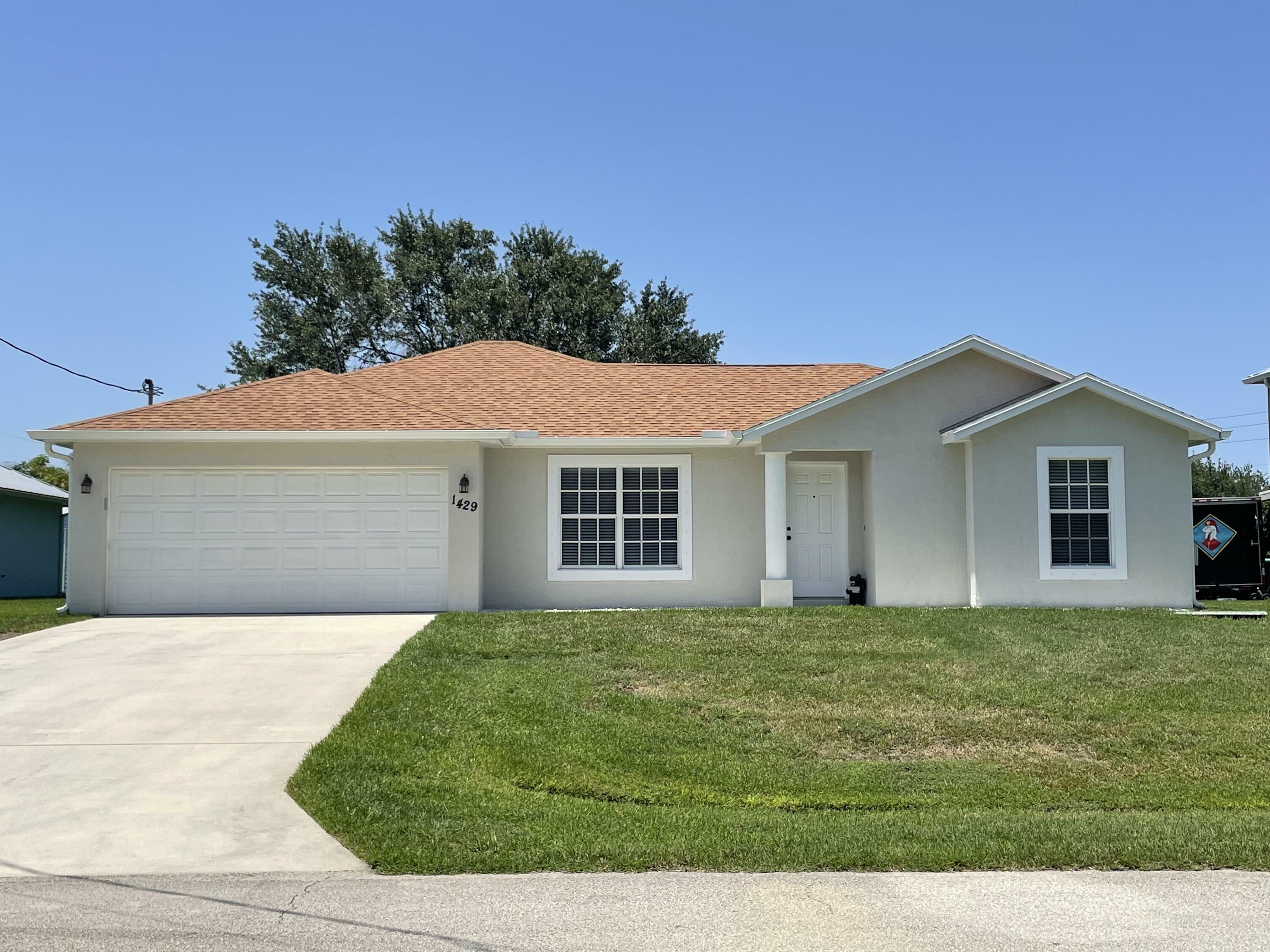 Property Photo:  1429 SW Abacus Avenue  FL 34953 