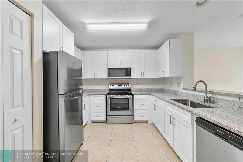 Property Photo:  2441 NW 14th Ct  FL 33311 