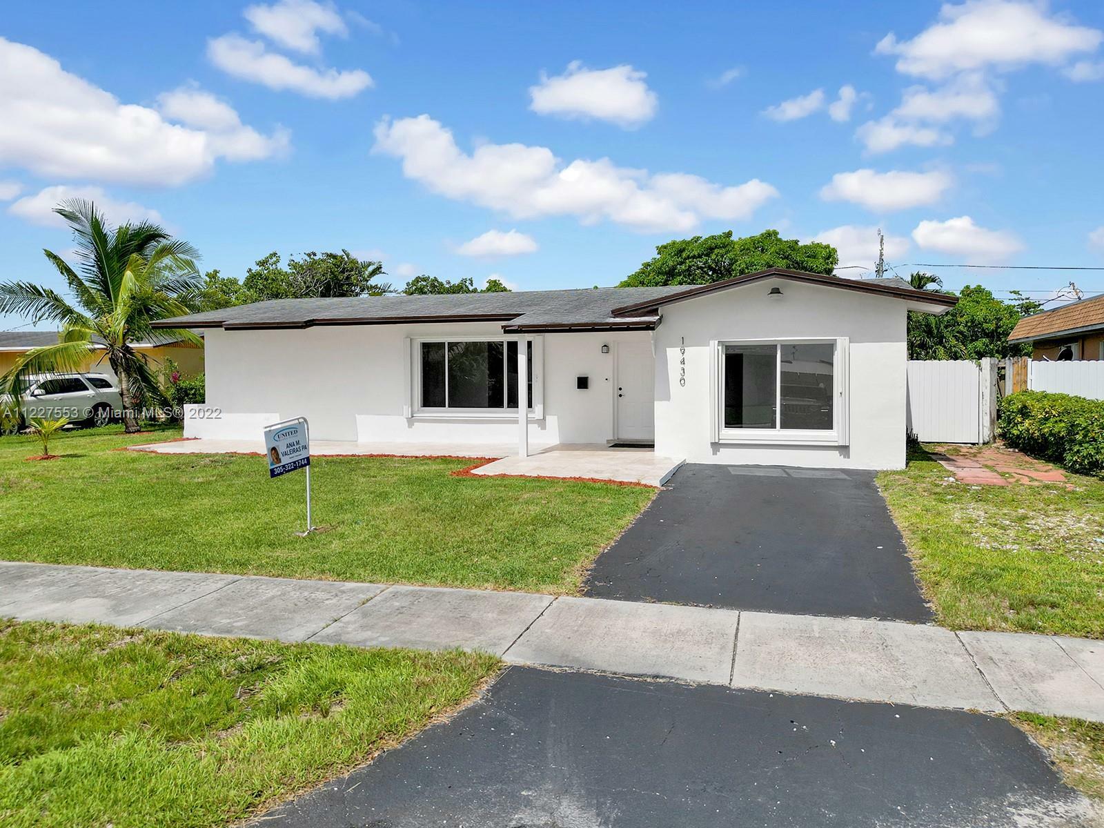 Property Photo:  19430 SW 117th Ct  FL 33177 