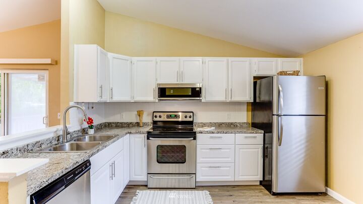 Property Photo:  12617 142nd Avenue E 105  WA 98374 