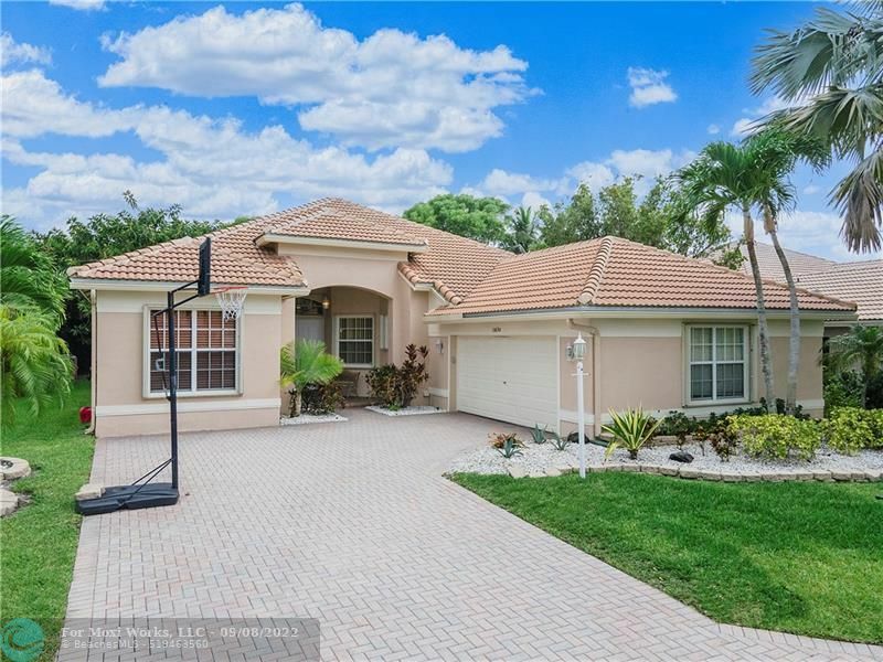 Property Photo:  10690 NW 62nd Ct  FL 33076 