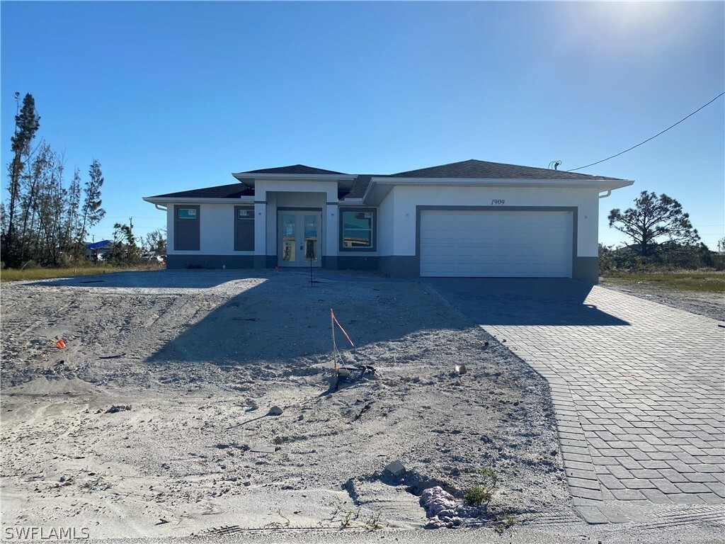 Property Photo:  1909 NW 24th Avenue  FL 33993 