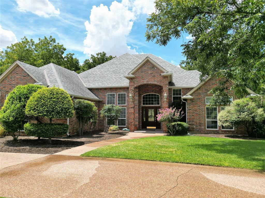 Property Photo:  9612 Champions Drive  TX 76049 