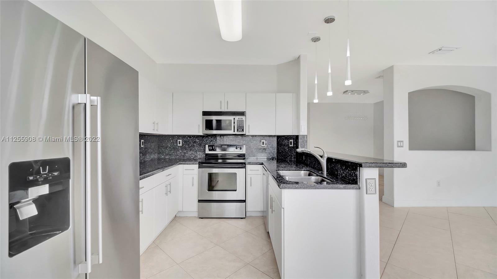 Property Photo:  10931 NW 79th St  FL 33178 