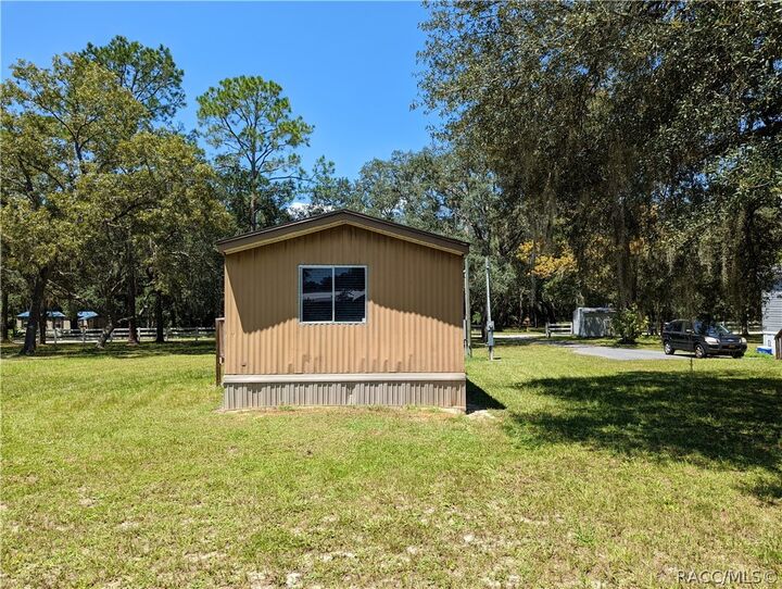 Property Photo:  7090 N Palmer Way  FL 34442 