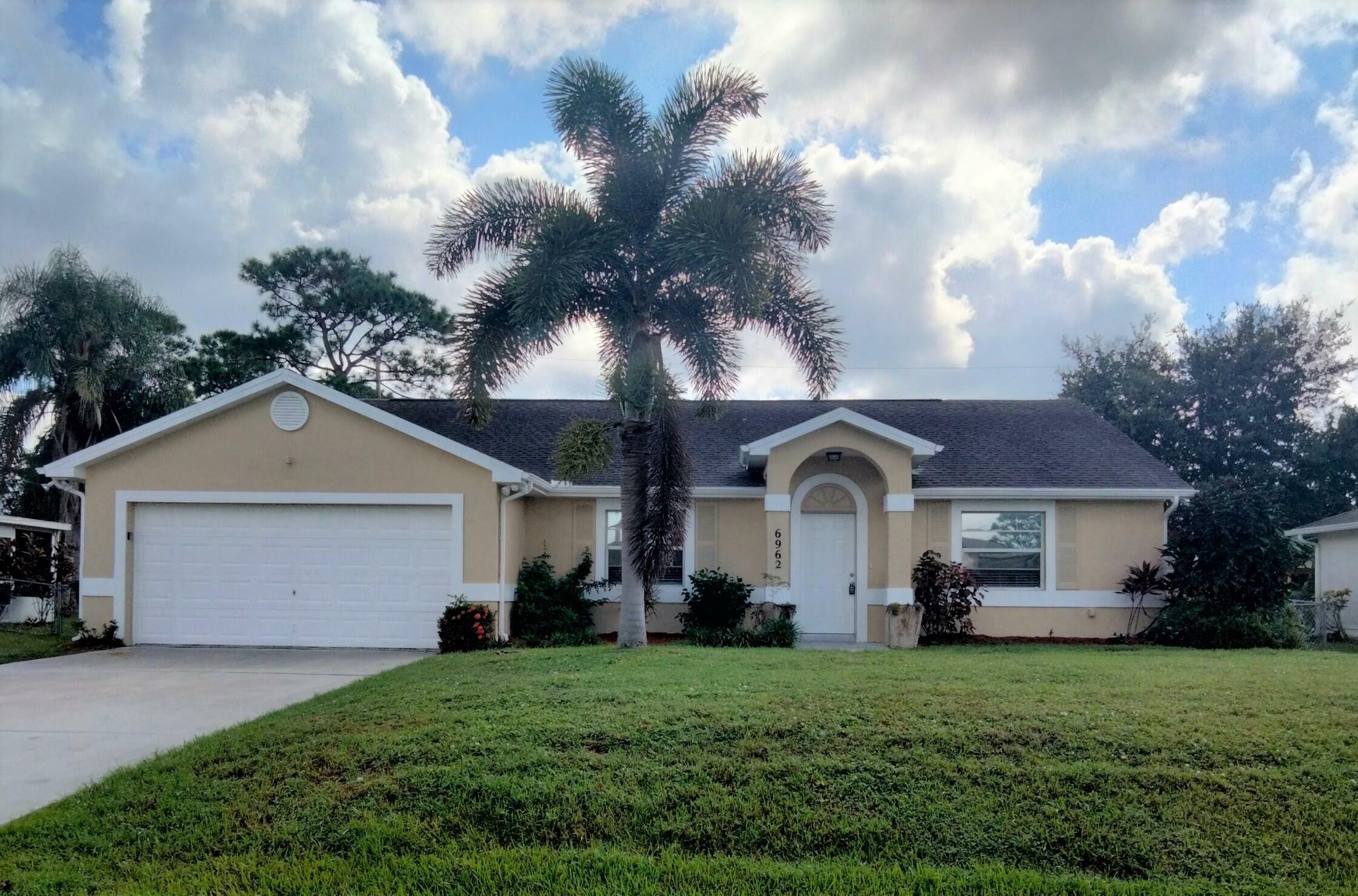 Property Photo:  6962 NW Hartney Way  FL 34983 