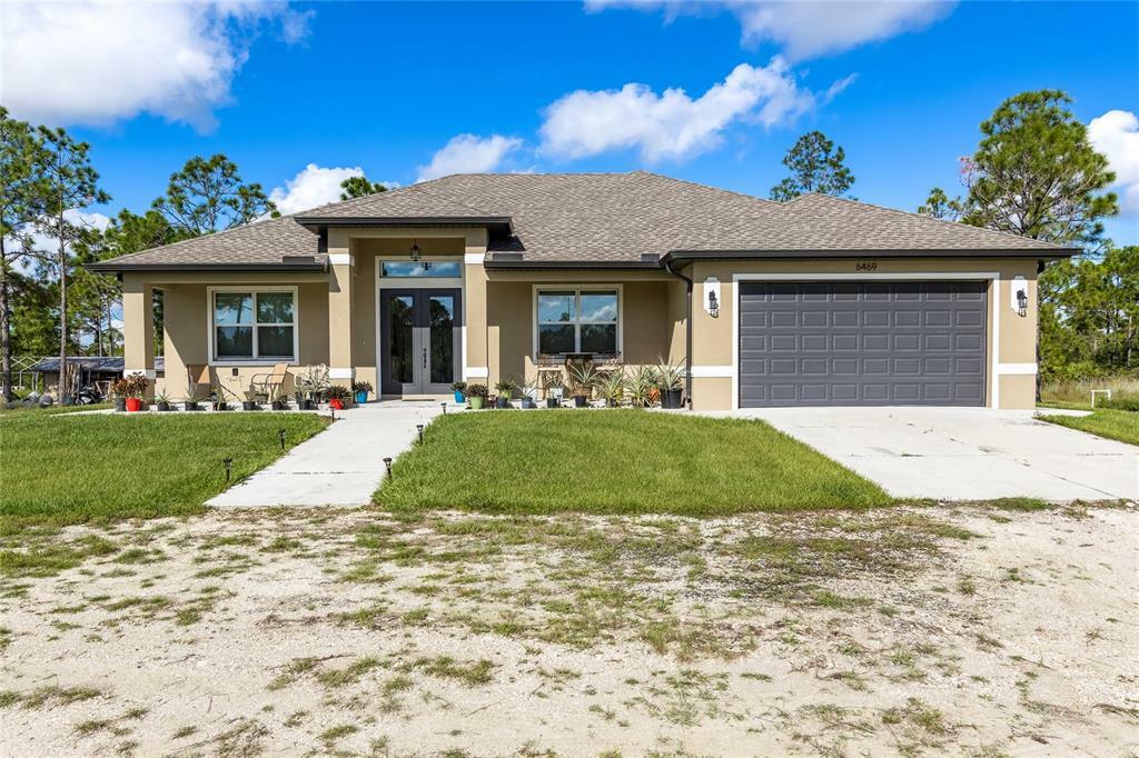 Property Photo:  6469 Acorn Boulevard  FL 33982 