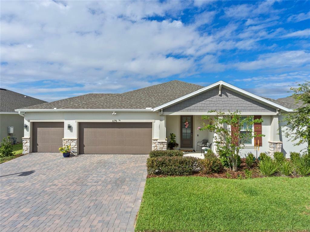 Property Photo:  679 Blue Citrus Lane  FL 34715 