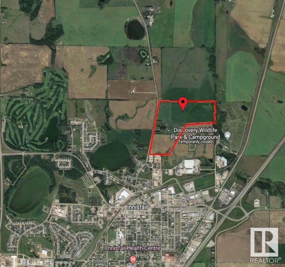 Property Photo:  6360 C & E Trail  AB T4G 0G9 
