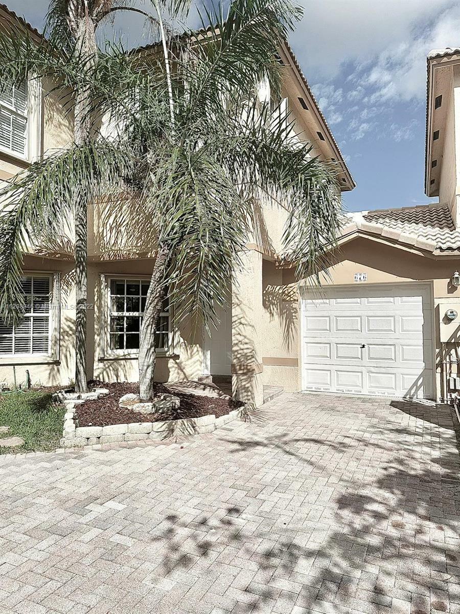 Property Photo:  676 NW 170th Ter 676  FL 33028 