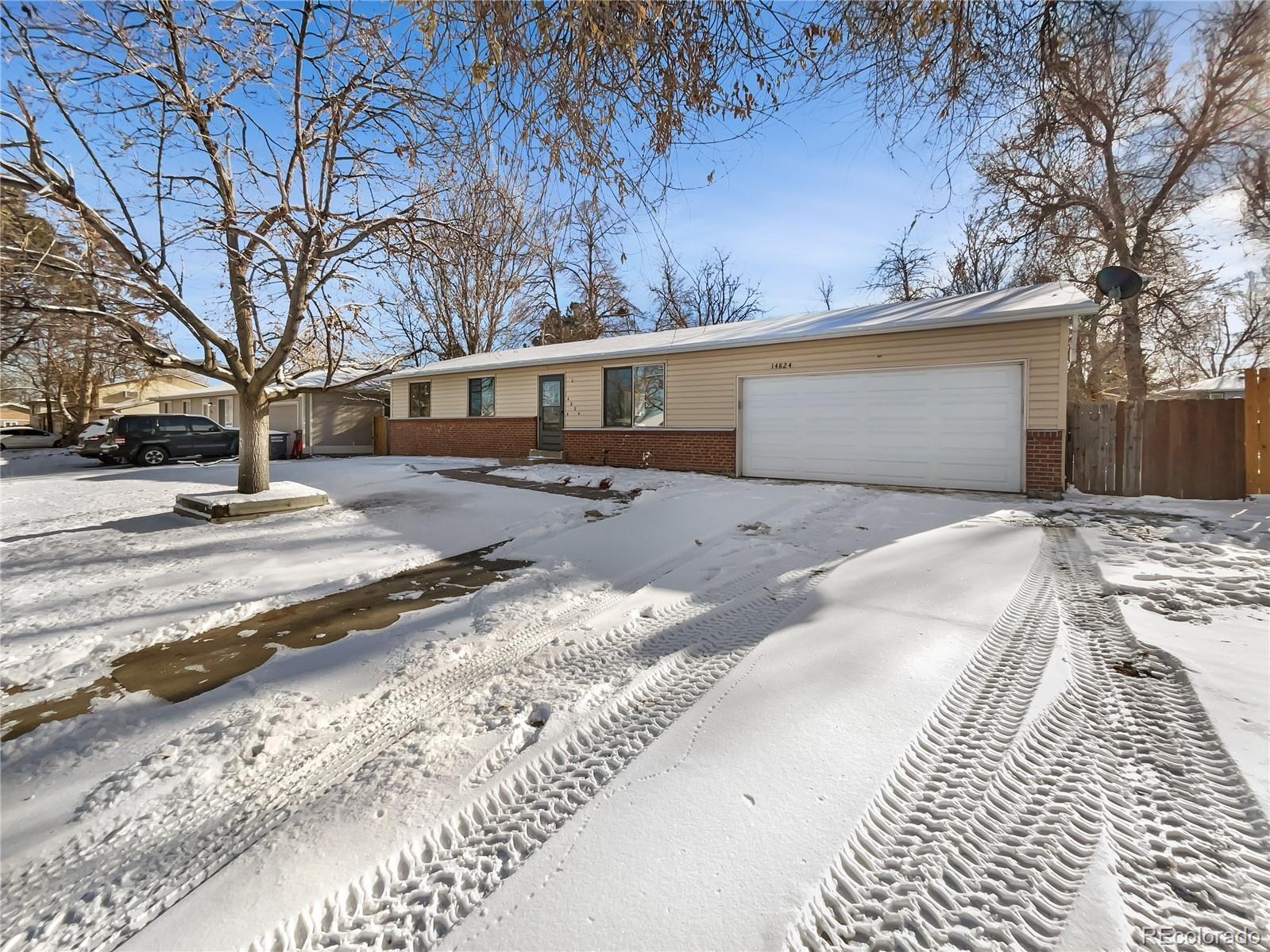 Property Photo: 14824 E Colgate Drive CO 80014