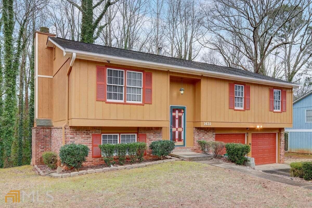 Property Photo:  1431 Red Cedar Trail  GA 30083 