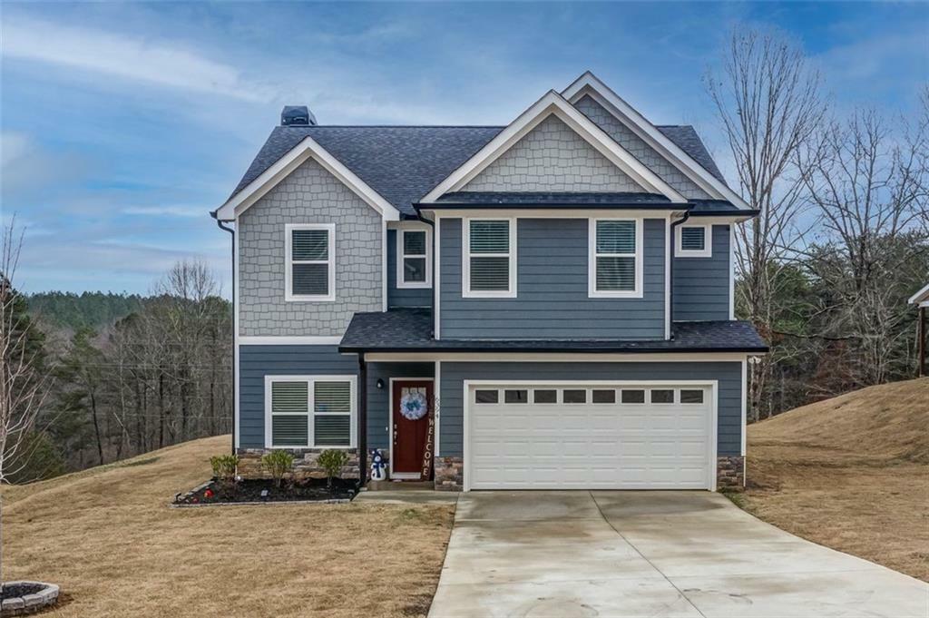 Property Photo: 6394 Woodland Station Drive GA 30554
